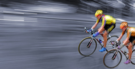 Speedy bicyclists in motion, race, rally, monochrome background,