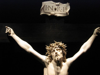 White statue of Chirst on black  background