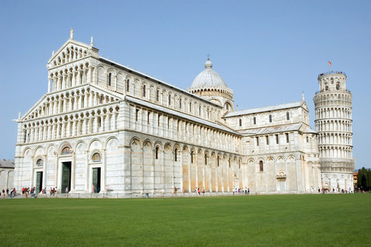 Side view of cathedral and leaning tower in Pisa Tuscany Italy