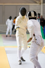 Two fencers practising their sport