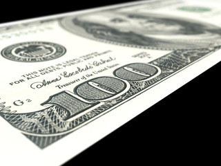 100 hunderd dollar close up. Black background