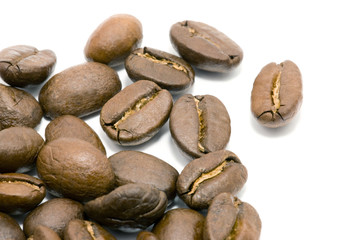 Fototapeta na wymiar Close-up coffee beans isolated on white