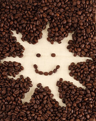 shape of sun in coffee beans background