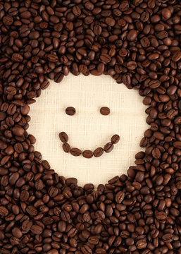 Smiley Face Shape In Coffee Beans Background