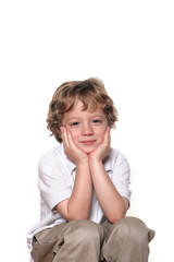 Four year old boy on white