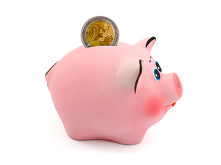 Piggy bank and coin isolated on white background
