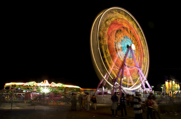 Fair rides viewed at night with long shutter speed.