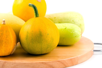pumpkins and squash on a white background