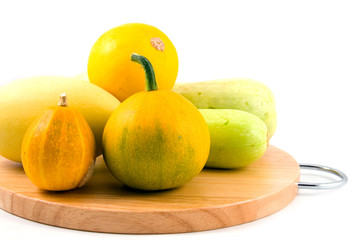 pumpkins and squash on a white background