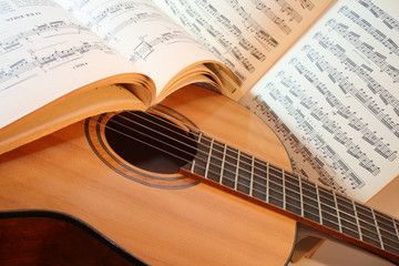 Obraz premium Acoustic guitar with notes