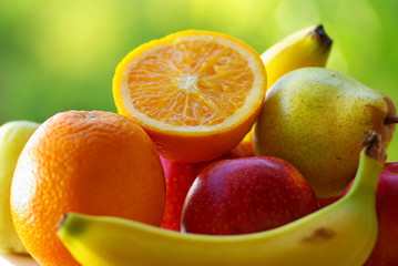 Basket of colored fruits.