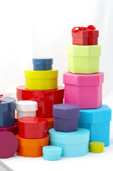 gifts wrapped with red and green paper with colorful ribbons