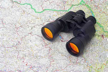 binoculars on map