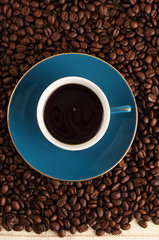 blue cup filled with coffee