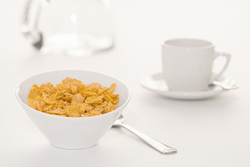 High key image of breakfast cereal in white bowl