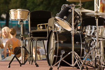 drums set on the scene with people and trees background