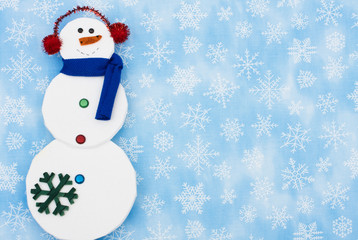 Snowman on snowflake background, merry Christmas