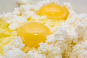 Cottage cheese and egg yolk, extreme close-up