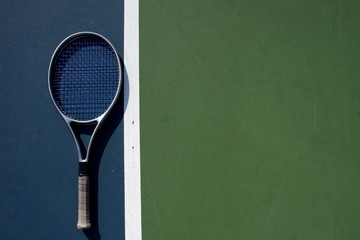 Tennis racquet on the court