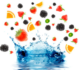 berry and fruit falling in juice. Isolation