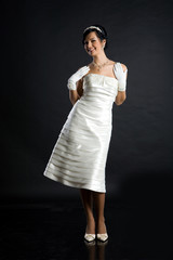 Young attractive woman in wedding dress