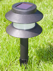 solar lantern on green grass