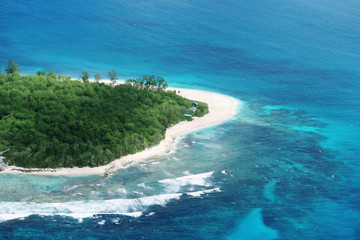 Aerial view of a beach on a tropical island