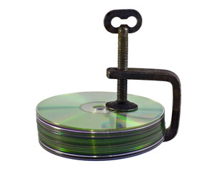 Bundle of CD disks pressed by old clamp