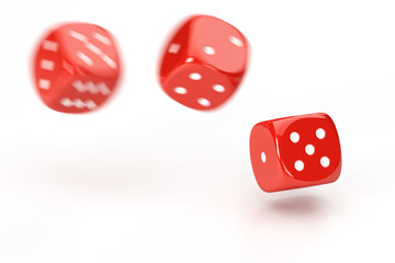 Rolling dices with motion blur isolated over a white background