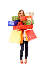 Attractive woman holding many gift boxes and bags