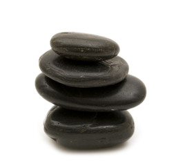 black stones on white background