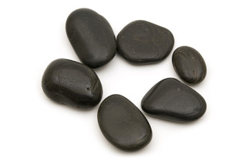 black stones on white background