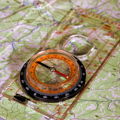close up photos of compass on the map