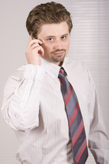 Young manager is speaking on the phone