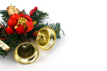 Christmas ornament with golden bells isolated on white.