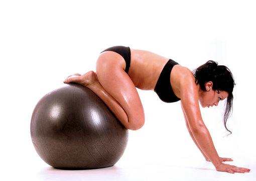 woman with pilates ball