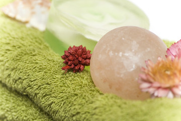 composition of flowers, spa towels and soaps