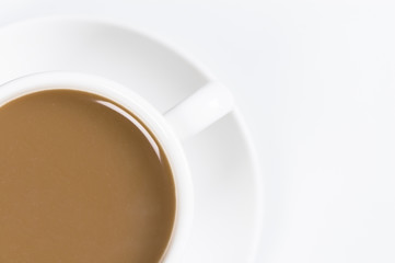closeup of cup of coffee over white background