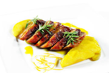 Roasted Duck Meat with Apple Slice and Sauce and Greens