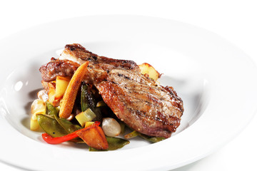 Brisket of Pork with Vegetables. Isolated on White Background