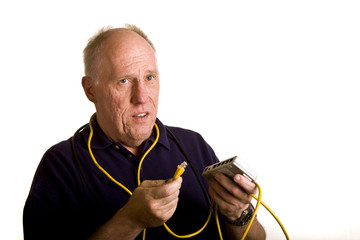 An old guy trying to figure out how to plug in a network cable
