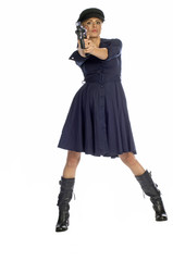 Blond woman in black pointing machine gun like terrorist