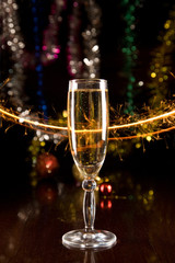 New Year card with champagne glass with sparkles © Elisanth