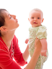 Happy baby with mom isolated on white