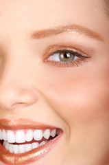 Beautiful young smiling  woman with great white teeth
