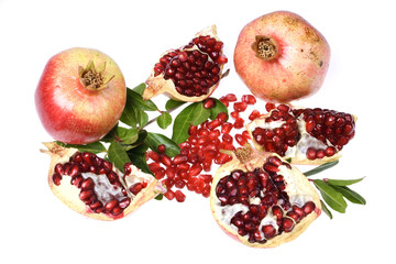 Ripe pomegranate fruit isolated on white background