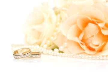 white rose and rings