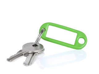 Two keys on a blank keyring, isolated on white.
