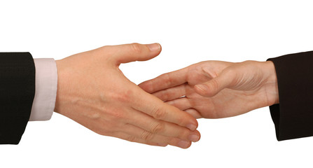 male and female hands about to shake