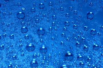 Natural blue water drops abstract background.